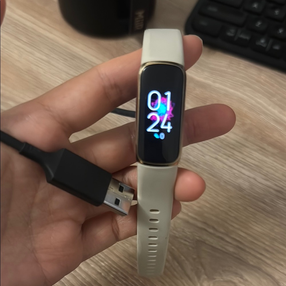 Fitbit Smartwatch White and Gold with Sleek Design